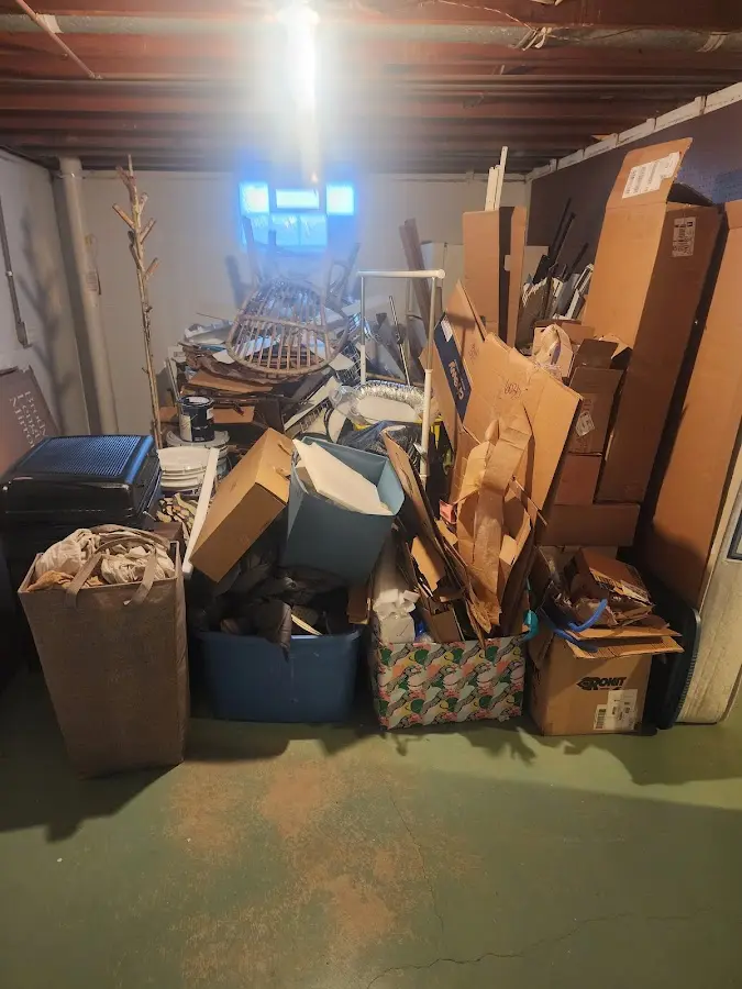 Roll-off dumpster container at job site for 15 Yard Dumpster Rental in Hartwell